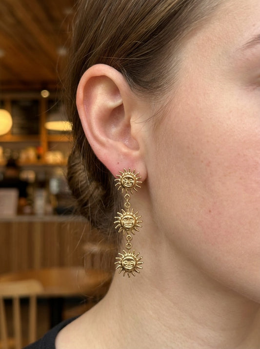 Boucles d'oreilles dorées à pendentifs triple soleils pendants