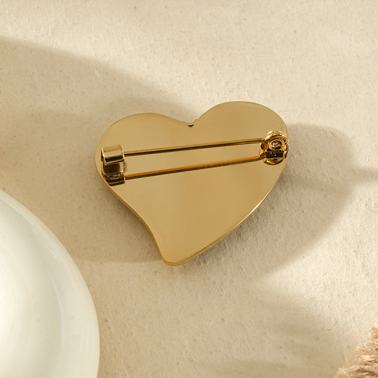 Broche dorée forme cœur résine léopard