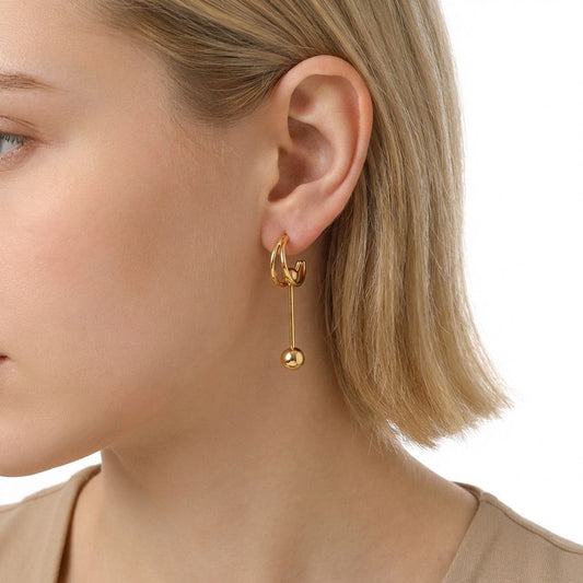 Boucles d’oreilles dorées créoles ouvertes avec tige pendante et boule