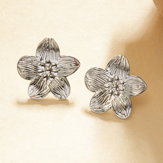 Boucles d'oreilles fleur martelée