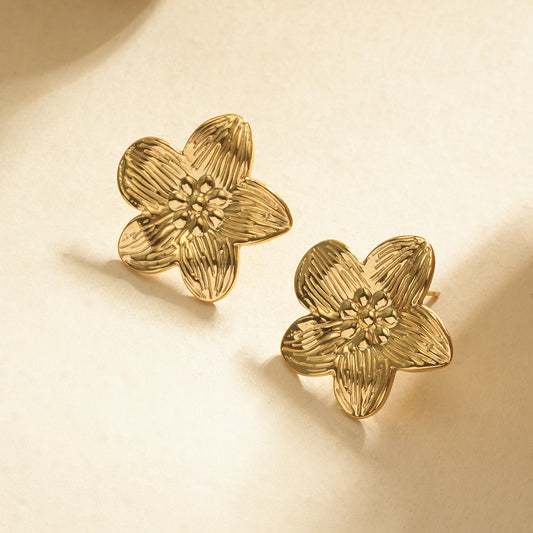 Boucles d'oreilles dorées fleur martelée