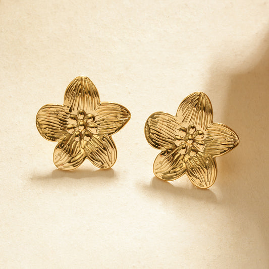 Boucles d'oreilles dorées fleur martelée