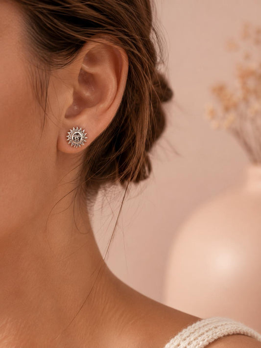 Boucles d'oreilles argentées motif soleil
