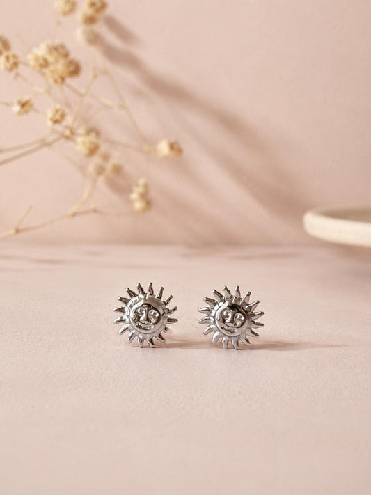 Boucles d'oreilles argentées motif soleil