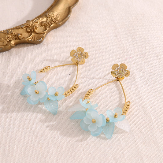 Boucles d'oreilles fleur pendante avec fleurs bleues