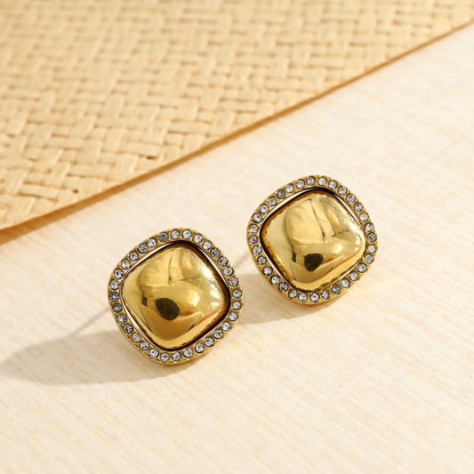 Boucles d'oreilles clous dorés bombés ornées de strass