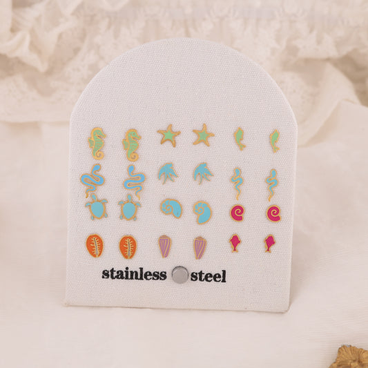 Lot de 12 puces d'oreilles colorées thème mer sur présentoir