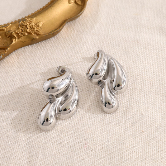 Boucles d'oreilles argentées assemblages gouttes scuptées