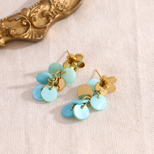 Boucles d'oreilles fleur pendante bleue