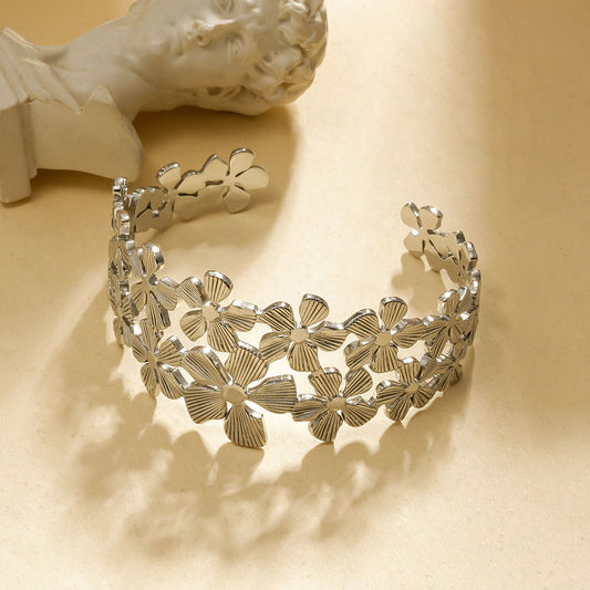 Bracelet manchette rigide multiples fleurs