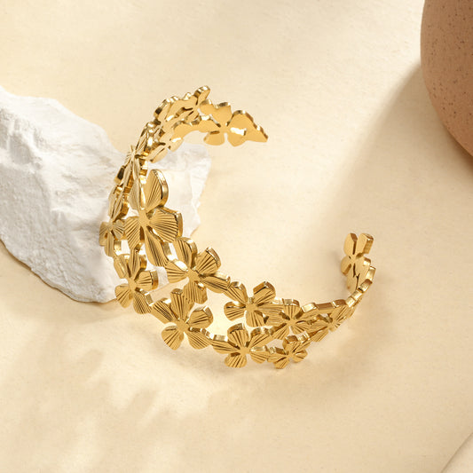 Bracelet manchette doré double ligne fleurs