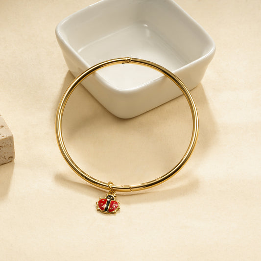 Bracelet rigide ouvrable pendentif coccinelle