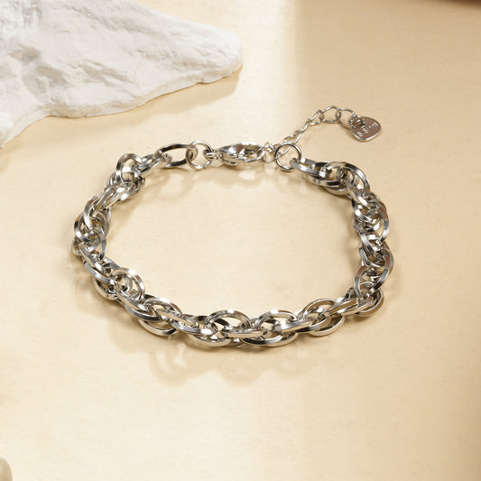 Bracelet Chaîne Argentée Maille Torsadée Plates Effet Brillant