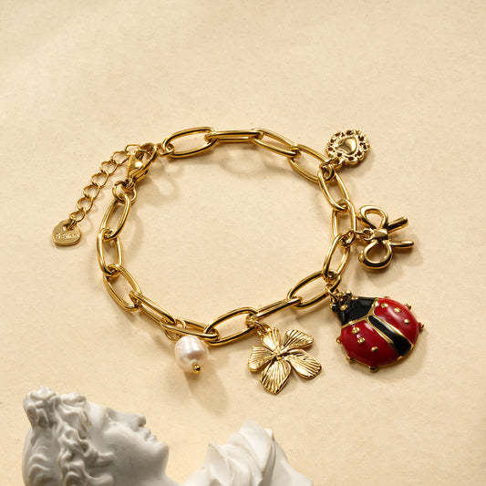Bracelet chaîne dorée breloques coccinelle thème jardin