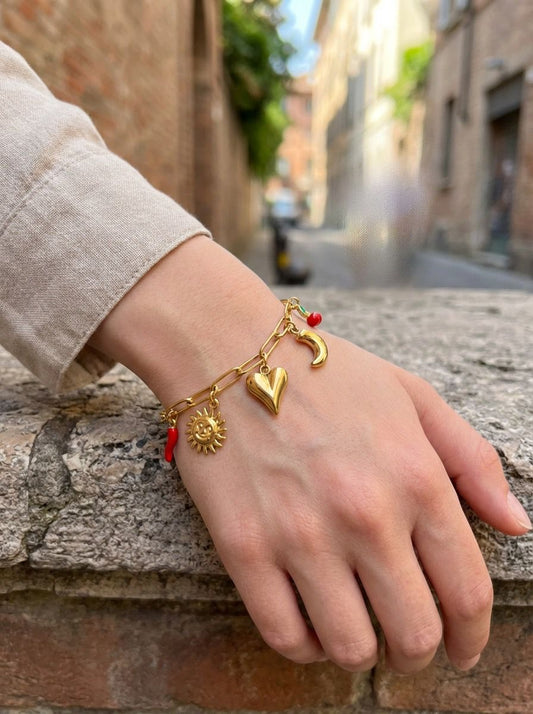 Collier chaîne dorée maillons breloques soleil lune