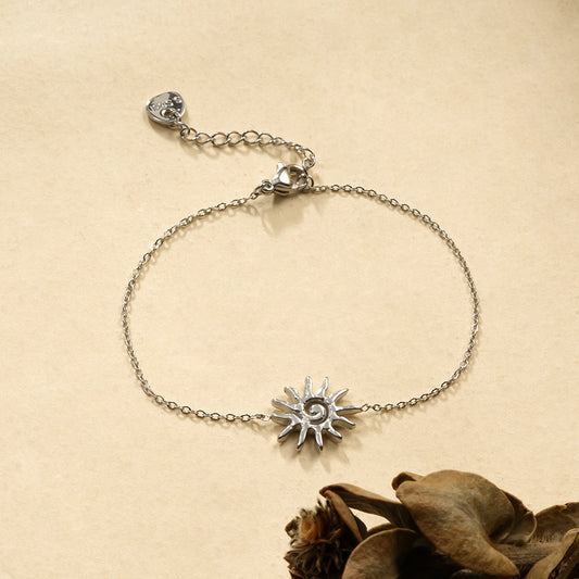 Bracelet chaîne argentée soleil spirale