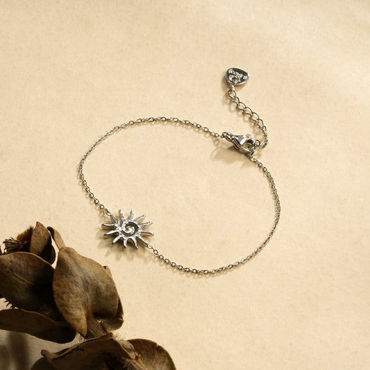 Bracelet chaîne argentée soleil spirale