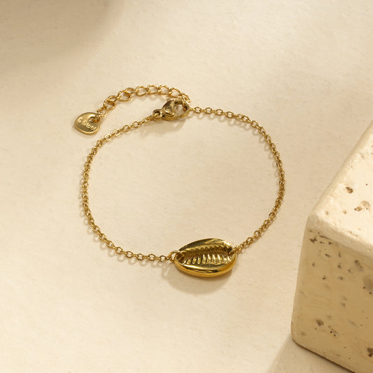 Bracelet chaîne dorée coquillage