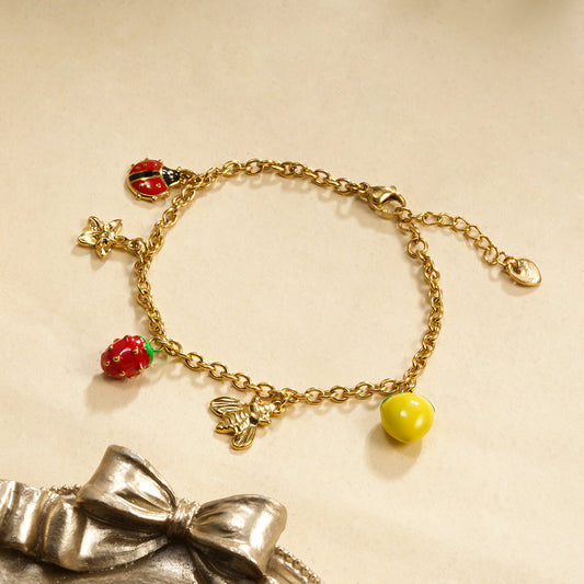 Bracelet chaine dorée thème fruits et coccinelle