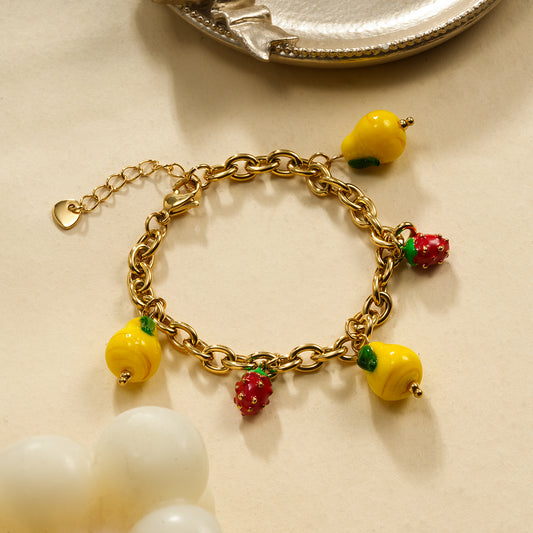 Bracelet chaîne dorée fraise et citron
