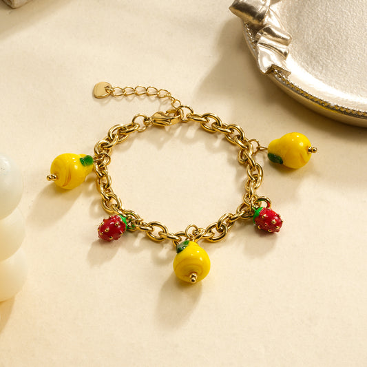 Bracelet chaîne dorée fraise et citron