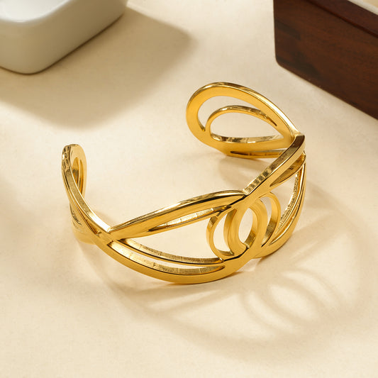 Bracelet Manchette Dorée Design Géométrique Ajouré