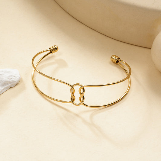 Bracelet Manchette Dorée À Anneaux Entrelacés Minimalistes