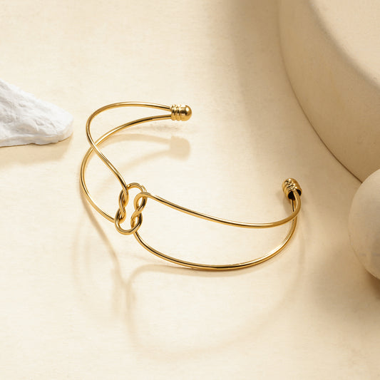 Bracelet Manchette Dorée À Anneaux Entrelacés Minimalistes