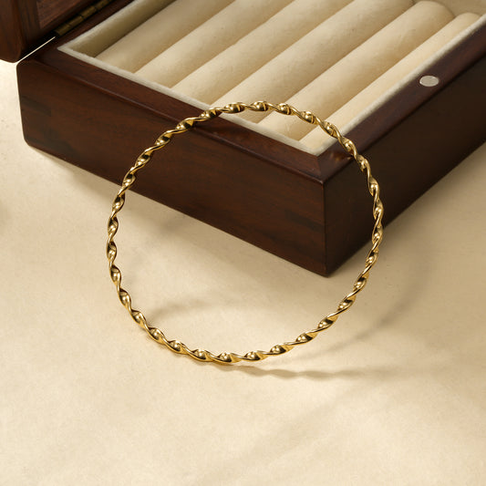 Bracelet Jonc Torsadé Doré