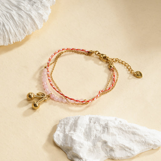 Bracelet doré triple chaine fil rouge pendentif cerise