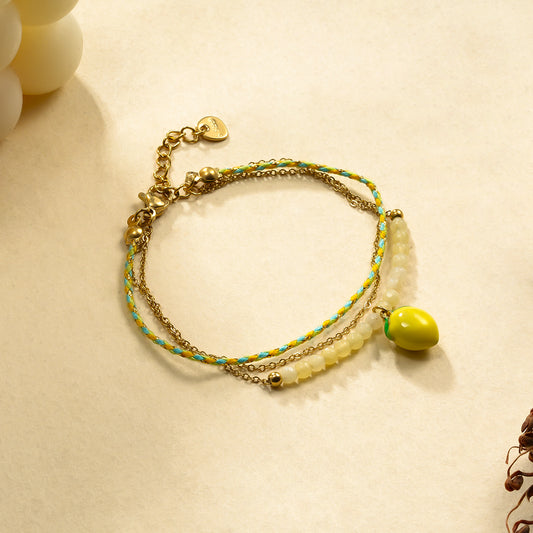 Bracelet triple chaîne jaune avec citron