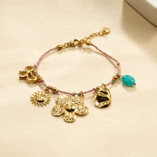 Bracelet cordon rose breloques fleur nœud