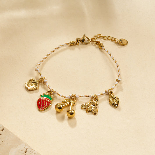 Bracelet cordon breloques cerise abeille et fraise