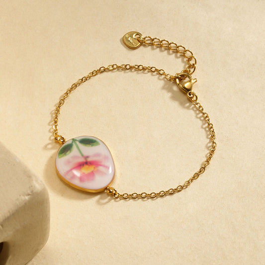 Bracelet chaîne fine avec fleur dessinée