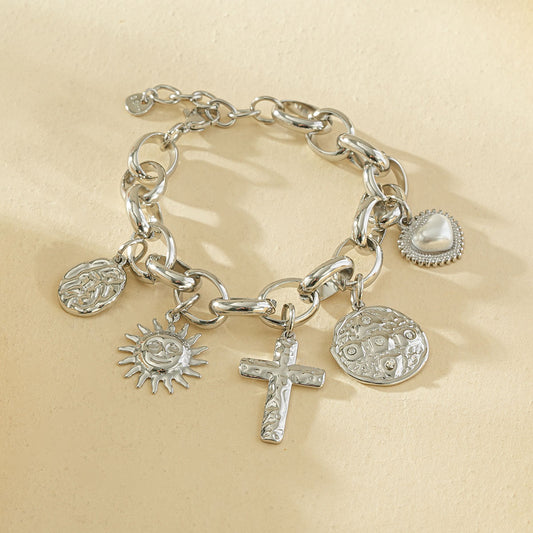 Bracelet chaîne argentée pendentifs martelés