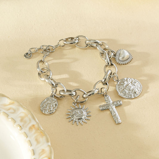 Bracelet chaîne argentée pendentifs martelés