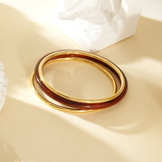 Lot de 3 bracelets jonc doré et résine ambré