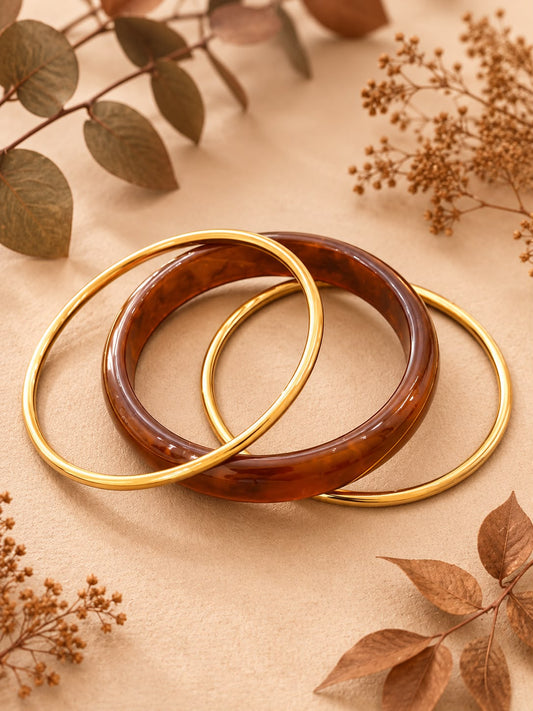 Lot de 3 bracelets joncs dorés et résine