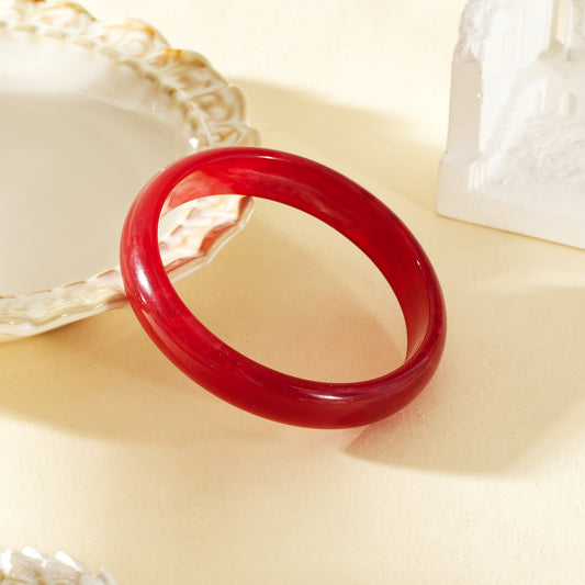 Bracelet jonc semi-fin rouge carmin marbré rond résine