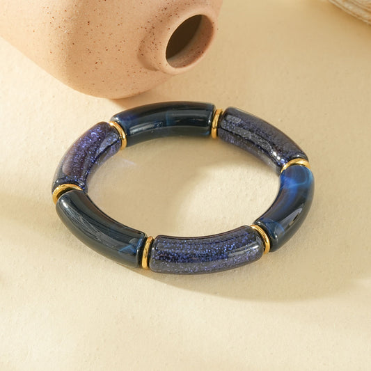 Bracelet élastique segments résine bleu et pailletée séparateurs dorés