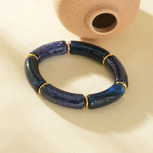 Bracelet élastique segments résine bleu et pailletée séparateurs dorés