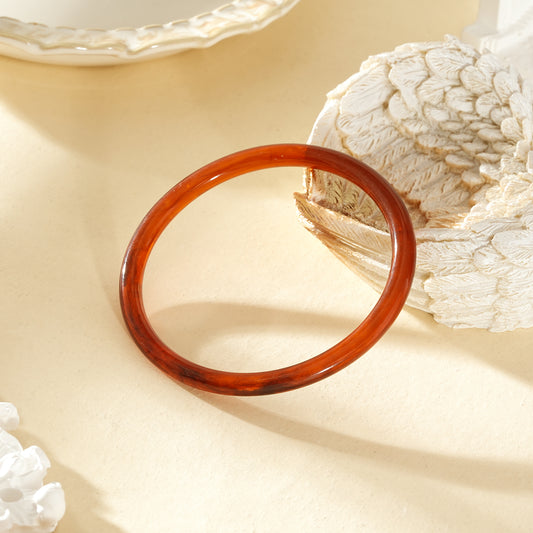 Bracelet jonc fin ambré rond résine