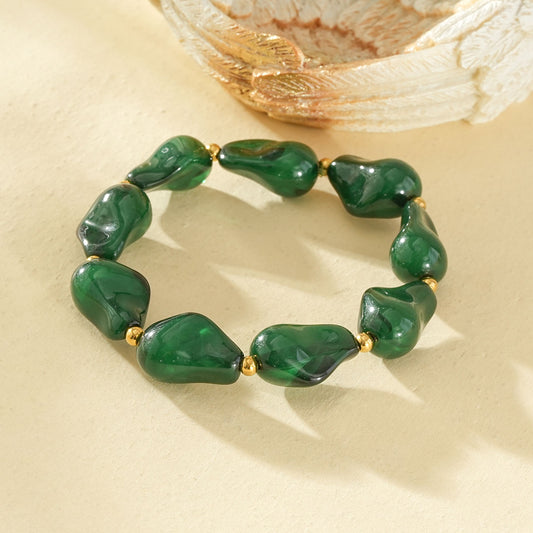 Bracelet élastique avec résine à forme irrégulière et billes dorés