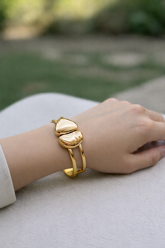 Bracelet manchette double anneau à finition miroir