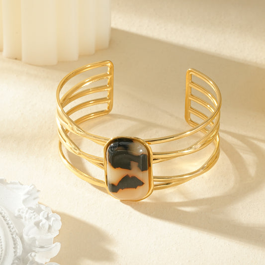 Bracelet manchette 5 branches entrecroisées ovale résine léopard