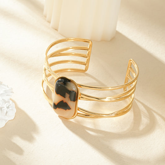 Bracelet manchette 5 branches entrecroisées ovale résine léopard