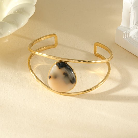 Bracelet manchette double branches pierre goutte résine léopard