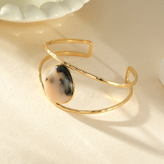 Bracelet manchette double branches pierre goutte résine léopard