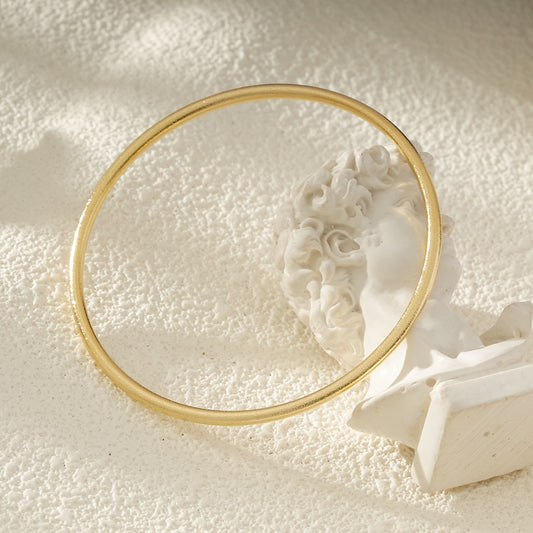 Bracelet Jonc Fin Doré Finition Brossée