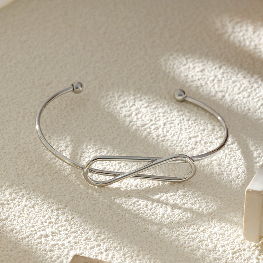 Bracelet Jonc Fin Ouvert Argenté Nœud Infini